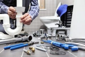 A Plumber Man and Plumbing Equipment