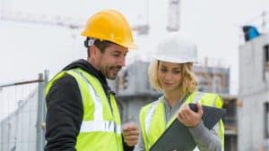 2 Person analyzing construction plans